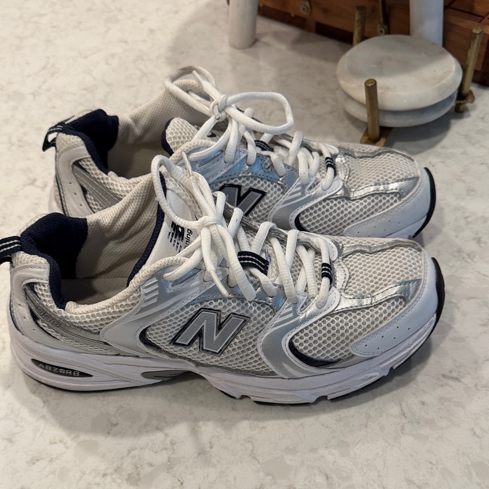 New Balance Woman’s White and Navy Sneakers
